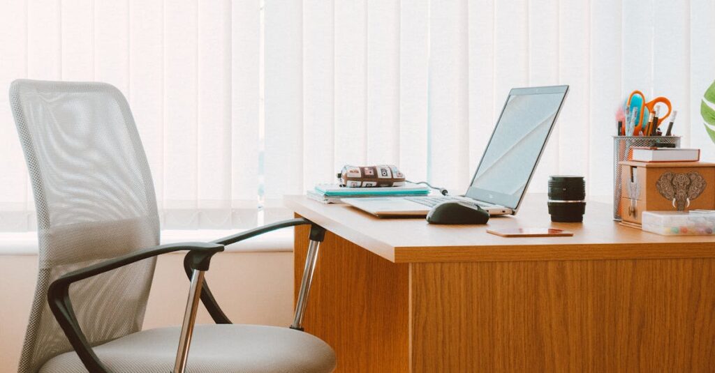 A tranquil modern home office featuring a wooden desk, ergonomic chair, and soft natural light.