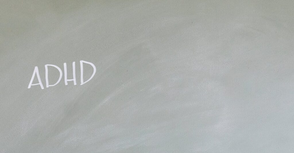 Simple depiction of ADHD awareness with text on a chalkboard.