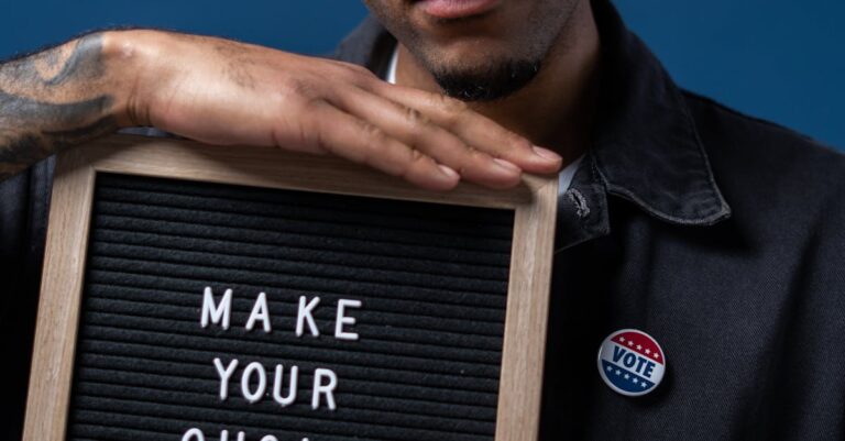 Serious man with 'make your choice' sign highlights the importance of voting and civic duty.