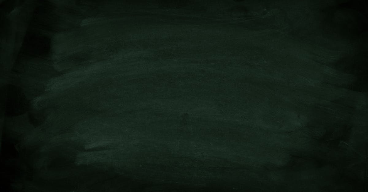 Dark green chalkboard with subtle chalk marks for background use.