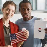 People holding US flag and voting papers, celebrating participation in voting day.