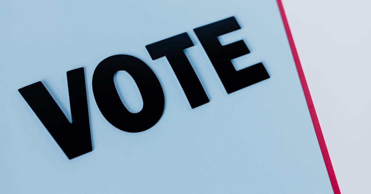 Close-up of the word 'VOTE' on a minimal background, emphasizing voting importance.